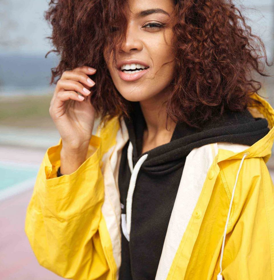 amazing-african-curly-young-woman-wearing-yellow-PCUMRSX-unsplash