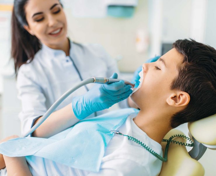 caries-removal-procedure-children-stomatology-H2ZESXA