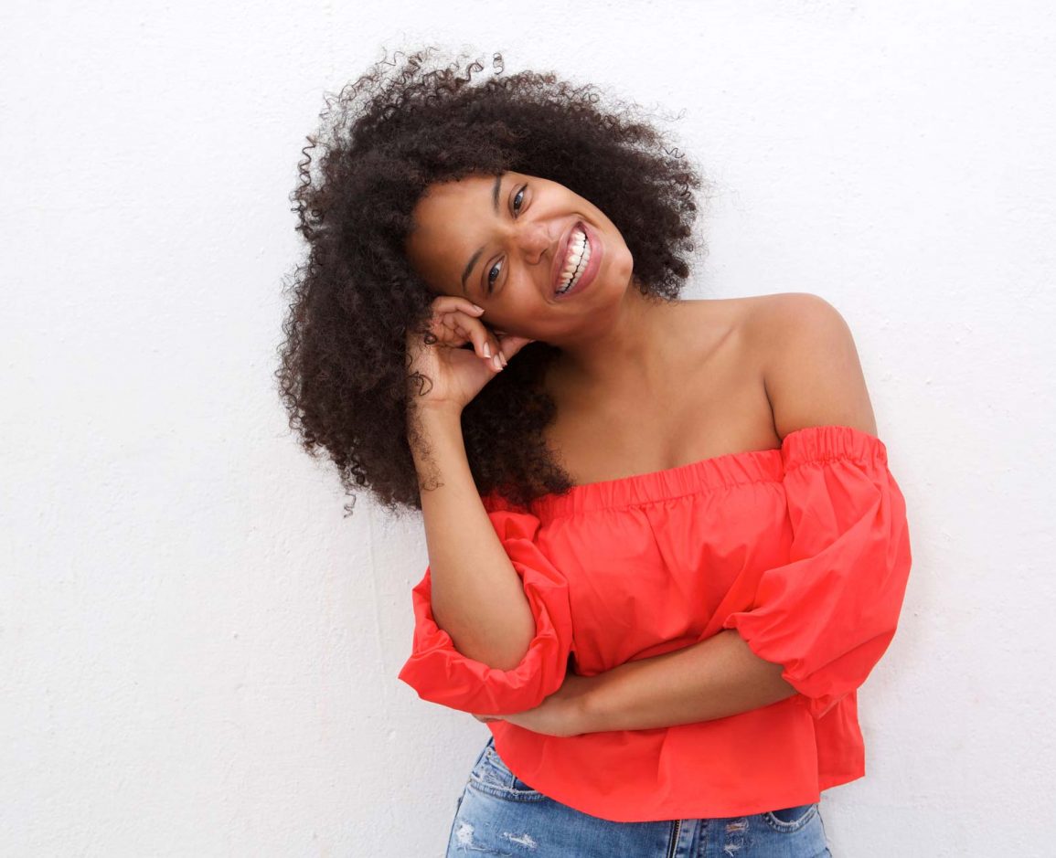 happy-african-american-woman-leaning-with-head-on-WXKZ6HD
